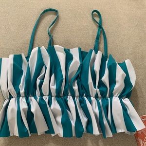 Brand new turquoise stripped ruffled up top